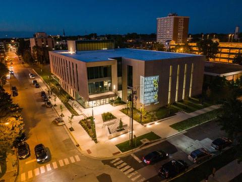 Marc McKee's poetry appears on the side of the Sinquefield Music Center.